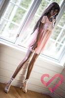 Темнокожая секс кукла Нава 168 в розовом платье (фото 3)