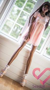 Темнокожая секс кукла Нава 168 в розовом платье (фото 4)