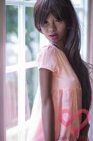Темнокожая секс кукла Нава 168 в розовом платье (фото 15)